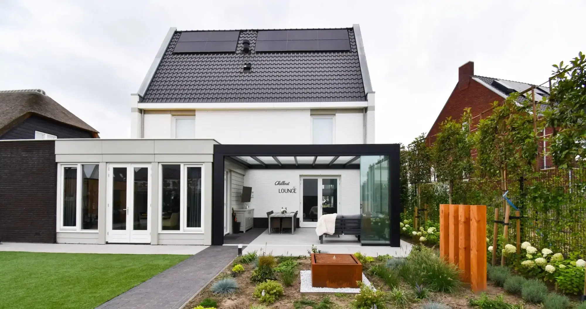 Cube veranda naast aanbouw